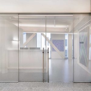 metafora-glass-partition-with-sliding-glass-door